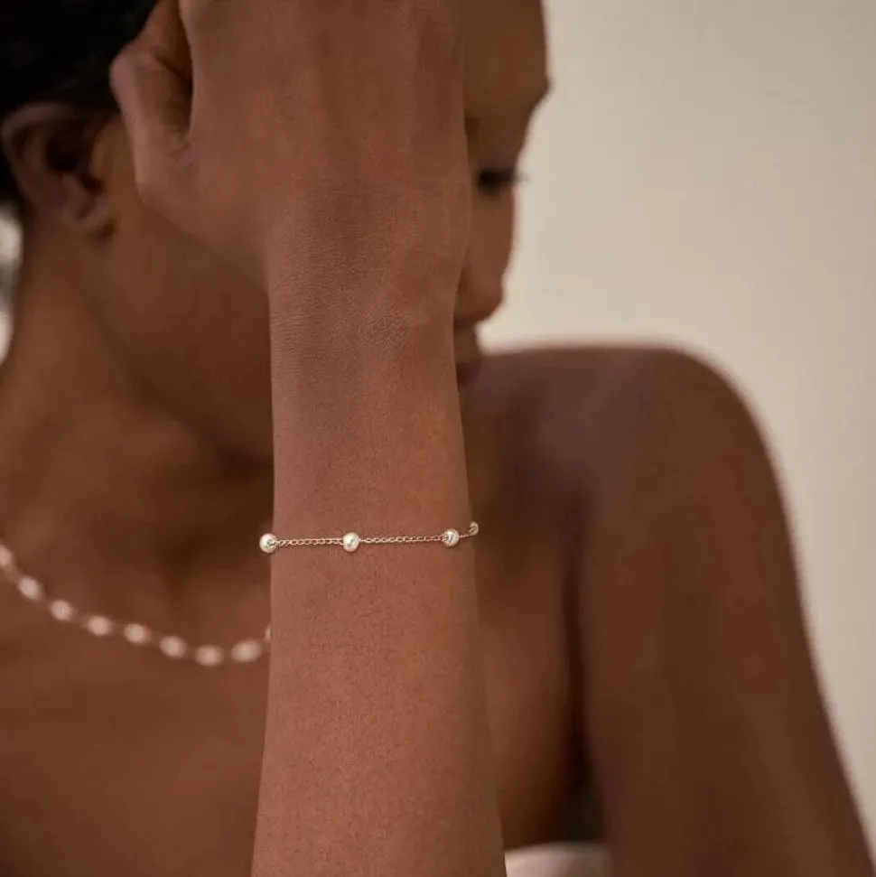 Bracelet en or avec perles
