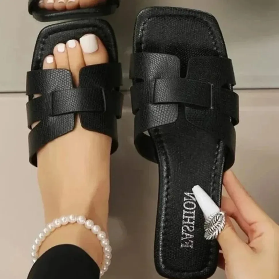 Claquettes noires pour femme
