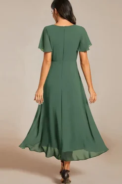 Robe de cocktail asymétrique verte
