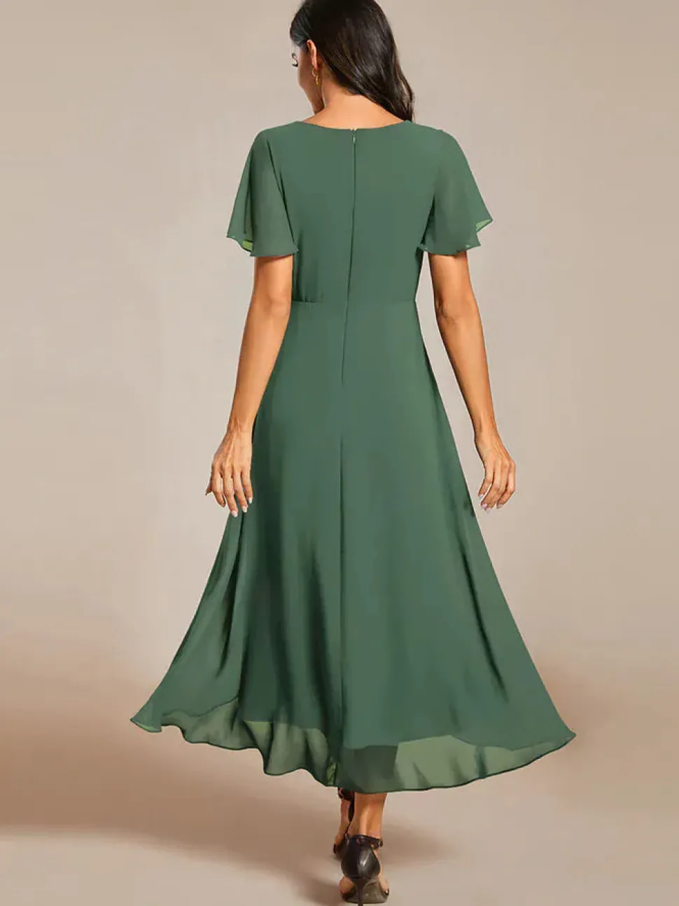 Robe de cocktail asymétrique verte