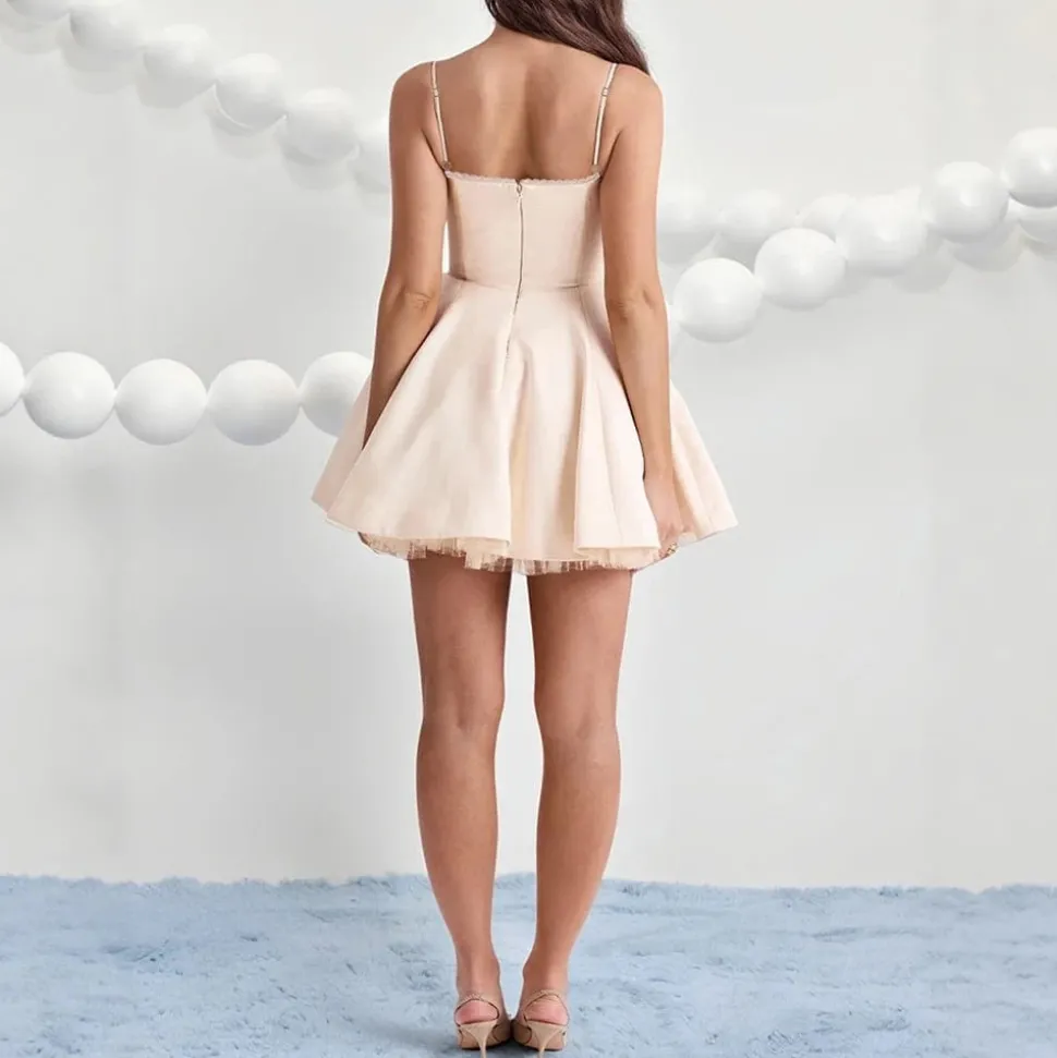 Robe de cocktail beige évasée jupe doublée
