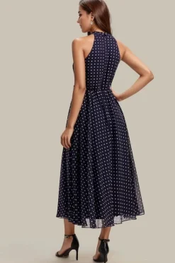 Robe de cocktail bleu marine à pois sans manches col licou