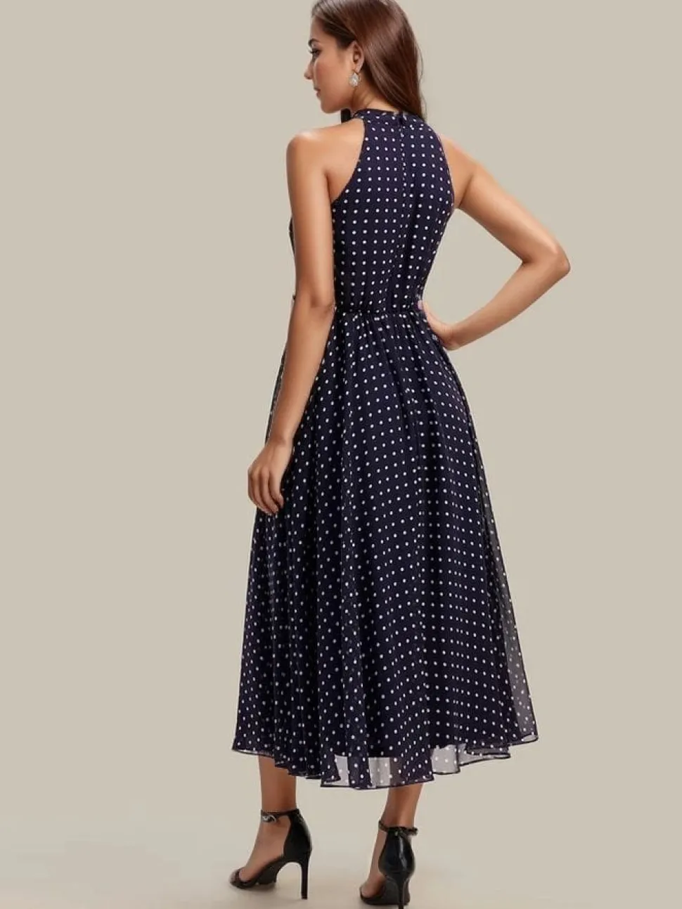 Robe de cocktail bleu marine à pois sans manches col licou