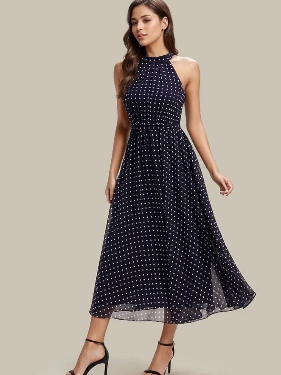 Robe de cocktail bleu marine à pois sans manches col licou