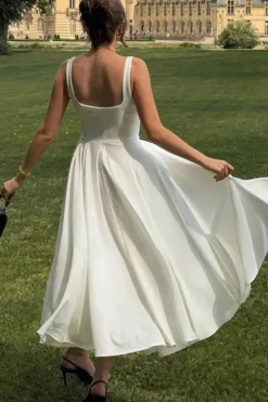 Robe de cocktail midi fluide à bretelles