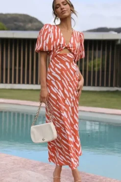 Robe de cocktail orange midi manches bouffantes