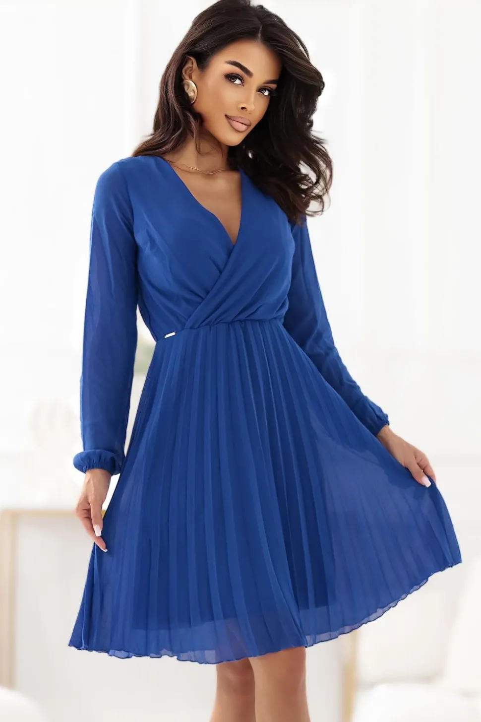 Robe de cocktail plissée manches longues