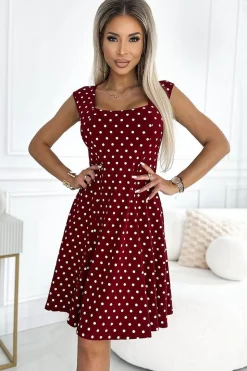 Robe de jour rouge à pois blancs