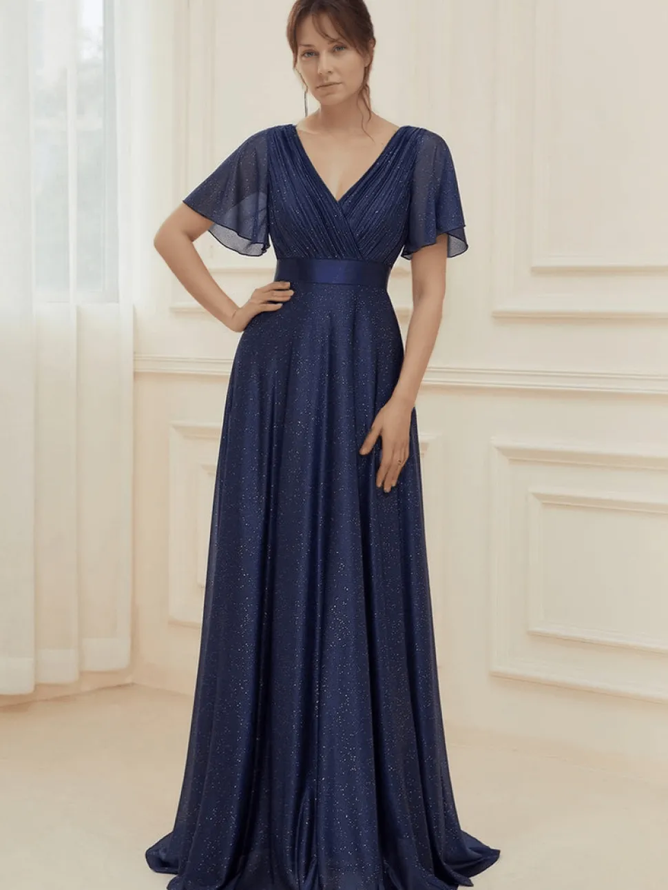 Robe de soirée bleue manches à volants scintillante