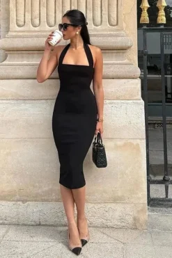 Robe de soirée chic noire midi dos nu