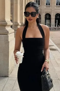 Robe de soirée chic noire midi dos nu