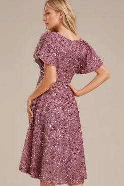 Robe de soirée rose à sequins manches courtes