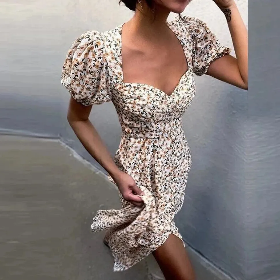 Robe fleurie fendue manches courtes bouffantes