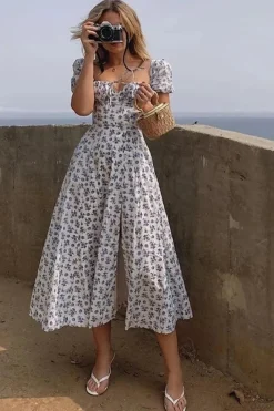 Robe fleurie midi manches courtes