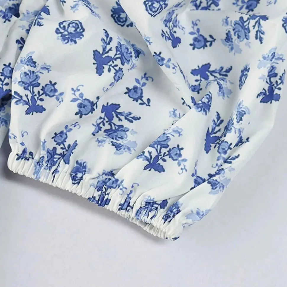 Robe fleurie midi manches courtes